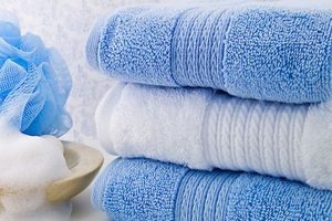 Рушники жорсткі після прання – що робити?