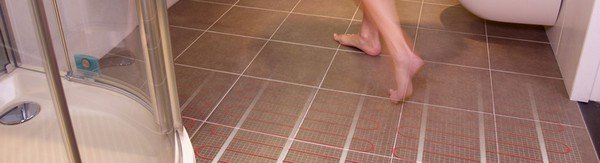 Тепла підлога під плитку: самостійна технологія укладання
