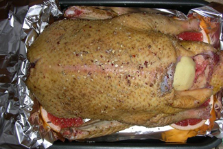 Індо качка фарширована айвою і чорносливом, фото рецепт