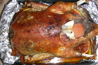 Індо качка фарширована айвою і чорносливом, фото рецепт